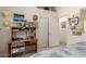 Bedroom featuring tile floors, a desk, and an area for study or hobbies at 2409 S Chestnut Pl, Chandler, AZ 85286