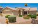 Single story home with well-manicured desert landscaping and a charming facade at 2409 S Chestnut Pl, Chandler, AZ 85286
