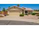 Charming single story home with a well-maintained front yard featuring desert landscaping at 2409 S Chestnut Pl, Chandler, AZ 85286