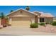 Charming single story home with a well-maintained front yard featuring desert landscaping at 2409 S Chestnut Pl, Chandler, AZ 85286
