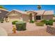 Single story home with well-manicured desert landscaping and a charming facade at 2409 S Chestnut Pl, Chandler, AZ 85286