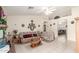 Comfortable living room featuring tile floors, brick fireplace, and neutral decor at 2409 S Chestnut Pl, Chandler, AZ 85286