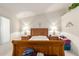 Spacious bedroom with wooden furniture at 2409 S Chestnut Pl, Chandler, AZ 85286