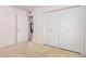 Bright bedroom features neutral carpeting and double door closet for optimal storage at 2956 E Concho Ave, Mesa, AZ 85204