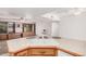 Open kitchen showcases a breakfast bar island, connecting to a spacious living area at 2956 E Concho Ave, Mesa, AZ 85204