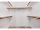 Walk-in closet with built in shelving offers ample storage space at 2956 E Concho Ave, Mesa, AZ 85204