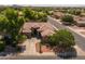 Aerial view of the home in a landscaped neighborhood with mature trees and wide streets at 2990 N Pearl Ct, Casa Grande, AZ 85122