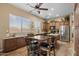 Eat-in kitchen with stainless appliances, granite countertops, and an island with seating for Gathering and friends to gather at 2990 N Pearl Ct, Casa Grande, AZ 85122