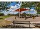 A neighborhood playground featuring climbing structure, spring riders, and shaded seating at 2990 N Pearl Ct, Casa Grande, AZ 85122