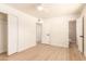Spacious bedroom with hardwood floors and access to an ensuite bathroom at 3118 W Windrose Dr, Phoenix, AZ 85029