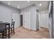 Inviting living space with travertine floors and neutral walls perfect for dining and entertaining at 357 E Thomas Rd # A208, Phoenix, AZ 85012