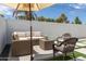 This backyard patio features a comfortable seating area, perfect for relaxing and enjoying the outdoors at 3814 N 36Th St, Phoenix, AZ 85018