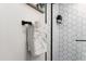 Updated bathroom features a black towel rack with towels hung up and modern shower head at 3814 N 36Th St, Phoenix, AZ 85018