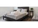 Comfortable bedroom featuring gray upholstered bed frame, wood floors and modern nightstands at 3814 N 36Th St, Phoenix, AZ 85018