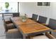 The outdoor dining area boasts a large table and chairs under a covered patio for comfort and style at 3814 N 36Th St, Phoenix, AZ 85018