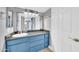 Bathroom featuring a large mirror, updated vanity and a modern, sleek faucet at 3825 E Camelback Rd # 182, Phoenix, AZ 85018