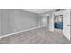 Bright bedroom with closet and open bath area with neutral walls and carpet at 3825 E Camelback Rd # 182, Phoenix, AZ 85018