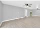 Spacious living area with luxury vinyl flooring and access to the kitchen at 3825 E Camelback Rd # 182, Phoenix, AZ 85018