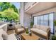Cozy outdoor patio area with comfortable seating, grill, and privacy wall perfect for relaxation at 3825 E Camelback Rd # 182, Phoenix, AZ 85018