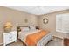 Well-lit bedroom with a window and neutral colors at 38771 N Dena Dr, San Tan Valley, AZ 85140