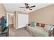 Bedroom features a cozy daybed, ceiling fan and neutral wall color at 38771 N Dena Dr, San Tan Valley, AZ 85140