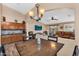 Charming dining space with views of the living area and kitchen, perfect for entertaining at 38771 N Dena Dr, San Tan Valley, AZ 85140