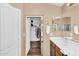 View from the bathroom of a well-organized walk-in closet at 38771 N Dena Dr, San Tan Valley, AZ 85140