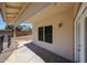 Covered back patio with access to the yard, perfect for outdoor entertaining and relaxation at 3897 E Douglas Loop, Gilbert, AZ 85234