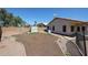 Large backyard with perimeter brick wall and exterior storage at 3897 E Douglas Loop, Gilbert, AZ 85234