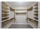 Walk-in closet with built-in shelving and hanging rods at 3897 E Douglas Loop, Gilbert, AZ 85234