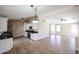 Open-concept kitchen with stainless steel appliances and tile flooring at 3897 E Douglas Loop, Gilbert, AZ 85234