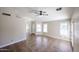 Open-concept living area with tile floors, neutral colors, and ample natural light at 3897 E Douglas Loop, Gilbert, AZ 85234