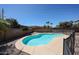 Inviting swimming pool surrounded by lush landscaping and a privacy fence for outdoor enjoyment at 3897 E Douglas Loop, Gilbert, AZ 85234