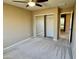 Cozy bedroom includes carpet floors, neutral paint, and a mirrored closet at 4332 E Oakland St, Gilbert, AZ 85295