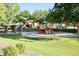 Community playground featuring a slide, climbing structure, and shaded picnic area for Gathering fun at 4332 E Oakland St, Gilbert, AZ 85295