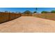 Spacious backyard area enclosed by high brick walls and desert landscaping at 4644 W Havasupai Dr, Glendale, AZ 85308