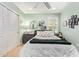Bedroom with calming green walls, a ceiling fan, and a cozy, inviting atmosphere at 4710 N 33Rd Pl, Phoenix, AZ 85018