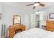 Bedroom with a wooden vanity, ceiling fan and an ensuite at 4710 N 33Rd Pl, Phoenix, AZ 85018
