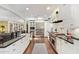 Modern kitchen with stainless steel appliances, white cabinets, and marble backsplash, designed for both style and functionality at 4710 N 33Rd Pl, Phoenix, AZ 85018