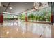 Bright basketball court featuring hardwood floors, hoops, and large windows with outdoor scenery at 7180 E Kierland Blvd # 507, Scottsdale, AZ 85254