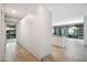 Open hallway leading to a modern kitchen and a bright living area at 7180 E Kierland Blvd # 507, Scottsdale, AZ 85254