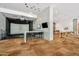 Entertainment area with golf simulator, seating, and bar area, perfect for leisure and social gatherings at 7180 E Kierland Blvd # 507, Scottsdale, AZ 85254