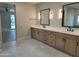 Spacious bathroom with double vanity, quartz countertop, and modern fixtures, providing ample space at 7724 E Charter Oak Rd, Scottsdale, AZ 85260
