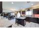 Bright kitchen offers granite countertops, a large island, stainless steel appliances, and an adjacent dining area at 9337 W Medlock Dr, Glendale, AZ 85305