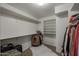 Spacious walk-in closet with ample shelving and clothing racks at 9337 W Medlock Dr, Glendale, AZ 85305