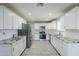 Modern kitchen with stainless steel appliances, granite counters, and ample cabinets at 1066 E 7Th Pl, Mesa, AZ 85203