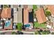 Aerial view of homes with pools and red tile roofs at 12770 W Alvarado Rd, Avondale, AZ 85392