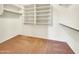 Walk-in closet with multiple shelves for ample storage at 12770 W Alvarado Rd, Avondale, AZ 85392