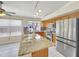 Open kitchen featuring stainless steel appliances, granite countertops and a functional kitchen island at 12770 W Alvarado Rd, Avondale, AZ 85392
