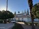 Elegant two-story home with a tile roof, a paved driveway, and a well-maintained landscaped yard at 1454 E Calle De Arcos --, Tempe, AZ 85284
